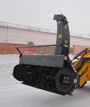 Шнекороторный снегометатель на экскаватор-погрузчик