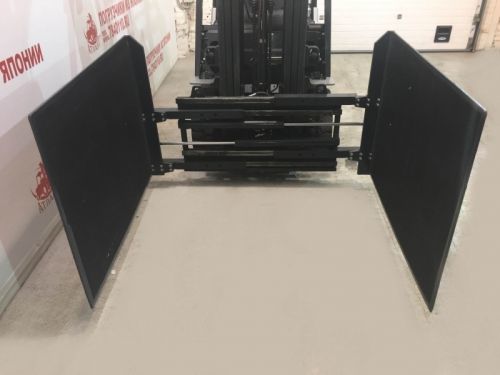 Зажимы на вилочные погрузчики